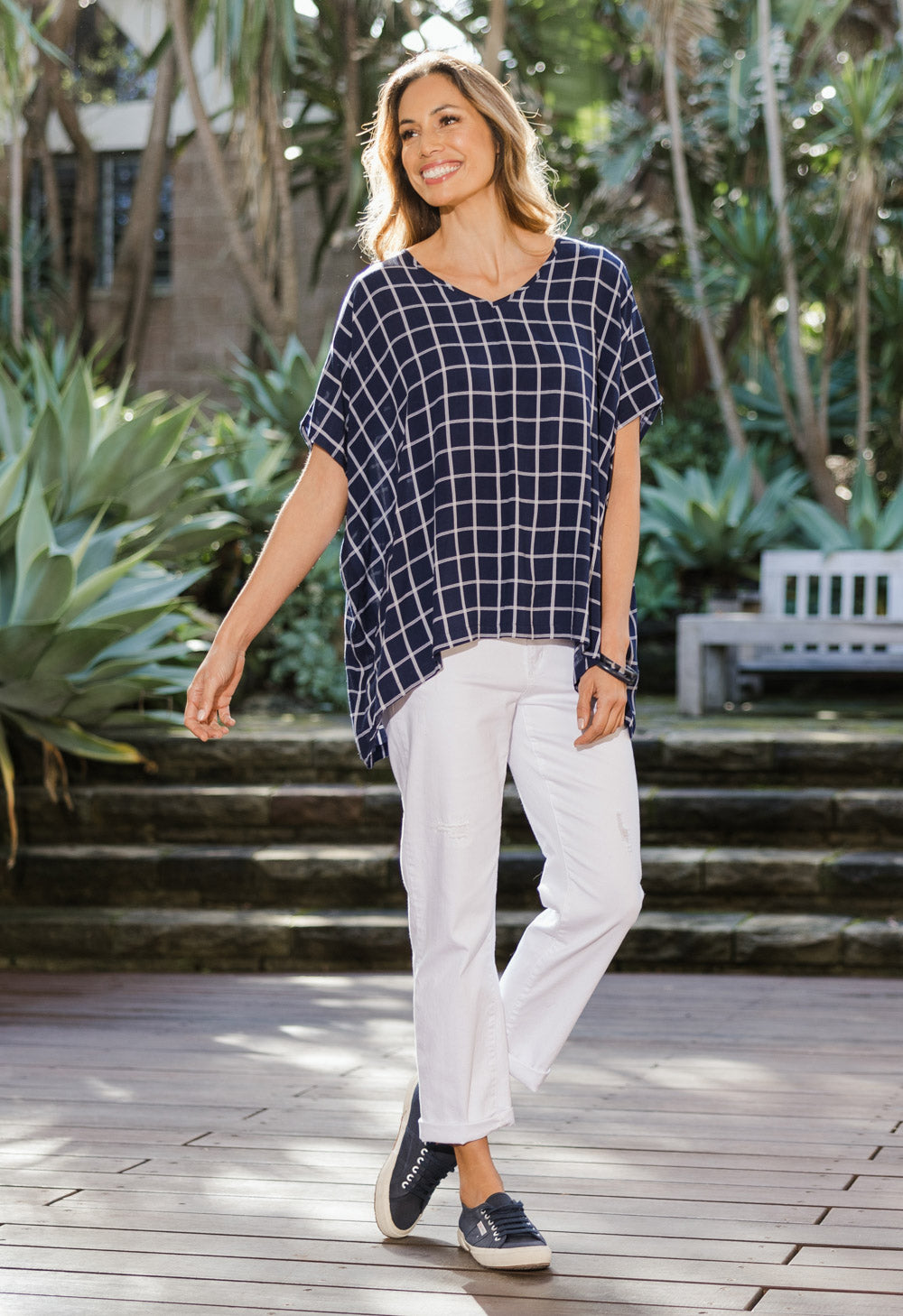 Model Amanda wearing size 10 of The Relaxed Fit Draped Top in colour Navywhite (Black), from the front, showing the whole outfit