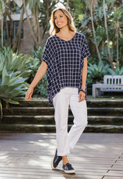 Model Amanda wearing size 10 of The Relaxed Fit Draped Top in colour Navywhite (Black), from the front, showing the whole outfit