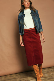 Model Madeline wearing size 10 of The 5 Pocket Cord Midi Skirt in colour Cherryred (Red), from the front, showing the whole outfit