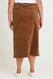 Model Chanel wearing size 16 of The 5 Pocket Cord Midi Skirt in colour Malt, from the back