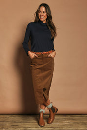 Model Madeline wearing size 10 of The 5 Pocket Cord Midi Skirt in colour Malt, from the front, showing the whole outfit