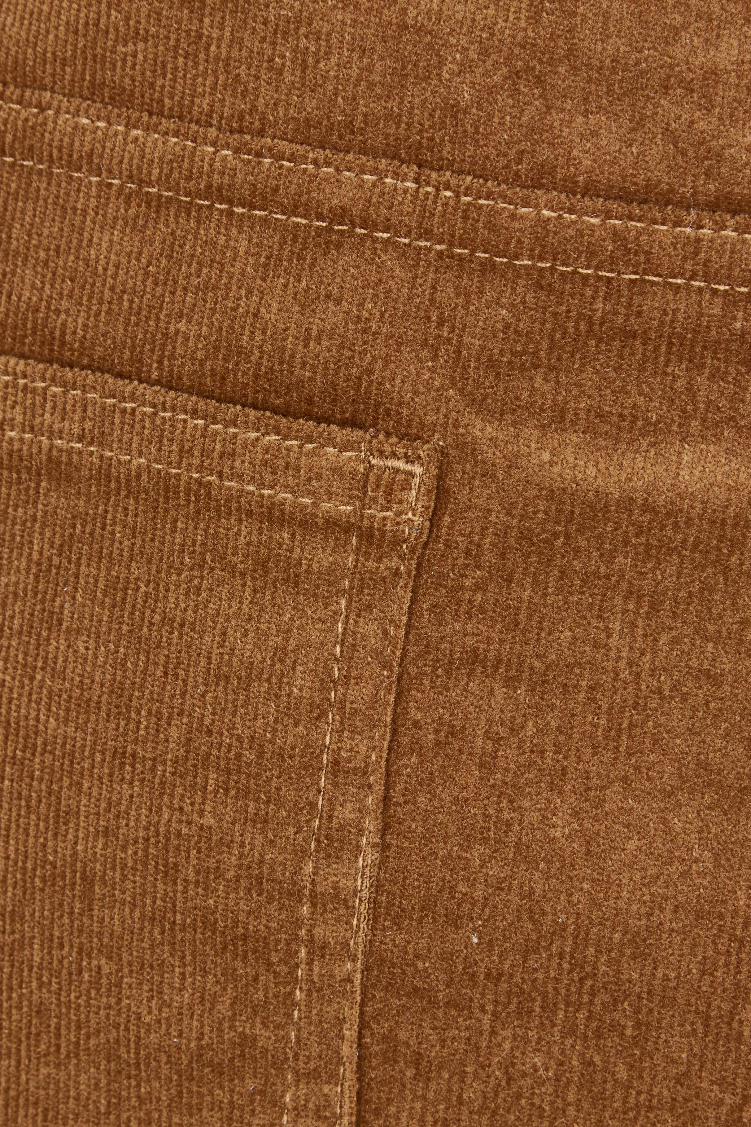 Product shot of The 5 Pocket Cord Midi Skirt in colour Malt, detail