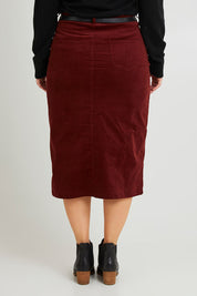 Model Laura wearing size 14 of The 5 Pocket Cord Midi Skirt in colour Nutmeg, from the back