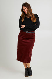 Model Laura wearing size 14 of The 5 Pocket Cord Midi Skirt in colour Nutmeg, from the front, showing the whole outfit