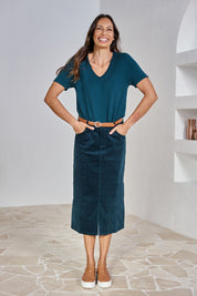 Model Amanda wearing size 10 of The 5 Pocket Cord Midi Skirt in colour Petrol (Blue), from the front, showing the whole outfit