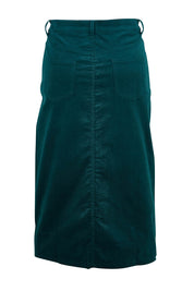 Product shot of The 5 Pocket Cord Midi Skirt in colour Petrol (Blue), from the back