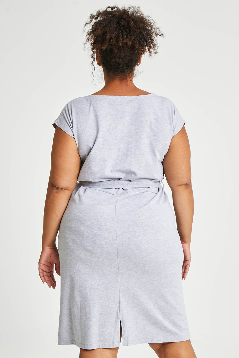 Model Alexis wearing size 16 of The Summer Tee Dress in colour Silvermarl (Grey), from the back