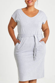 Model Alexis wearing size 16 of The Summer Tee Dress in colour Silvermarl (Grey), from the front, cropped image