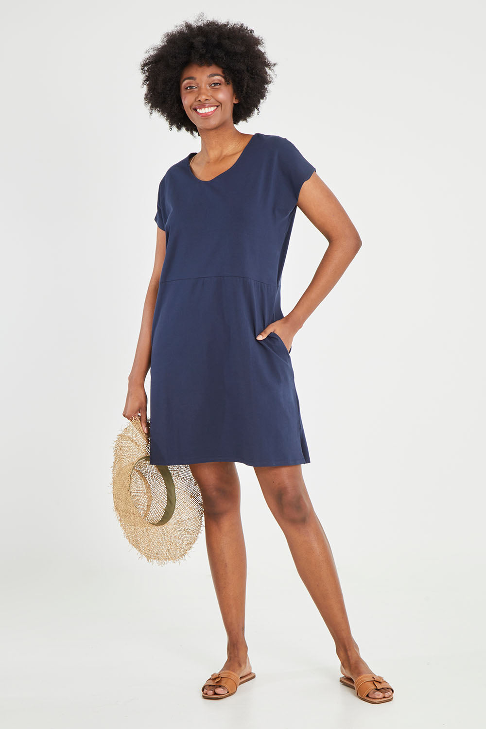 Model Aiyana wearing size 10 of The Luxe Cotton Tee Dress in colour Navy (Blue), from the front, showing the whole outfit