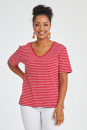 Model Noli wearing size 14 of The Keepers V Neck Striped Rib Tee in colour Red (Red), from the front, cropped image
