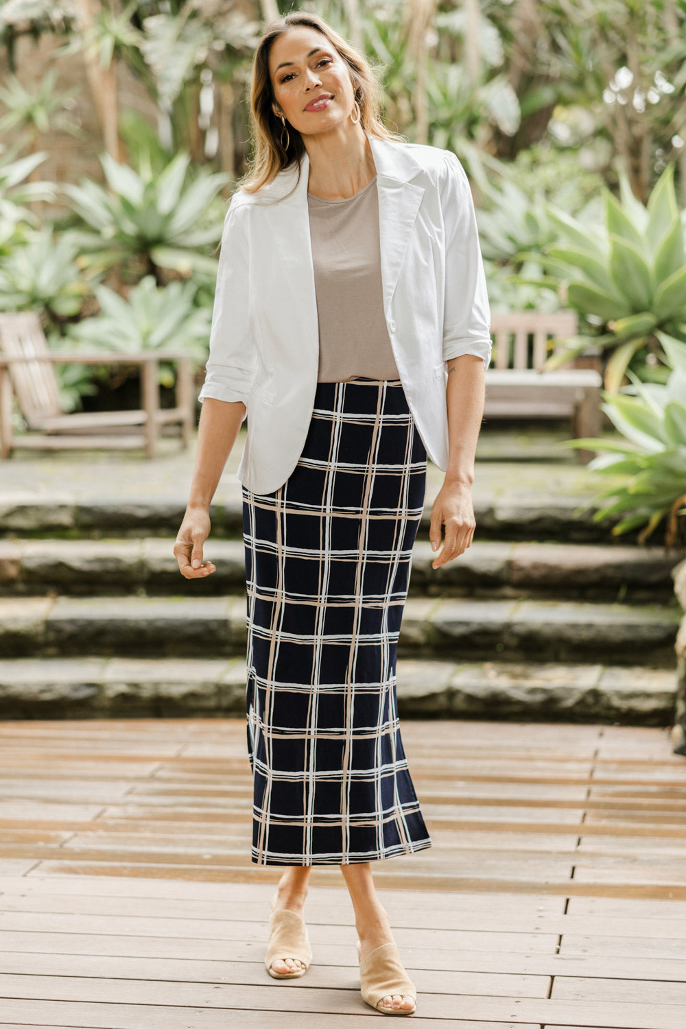 Model Amanda wearing size 10 of The Printed Easy Wear Maxi Skirt in colour Bluecheck (Blue), from the front, showing the whole outfit