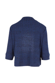Product shot of The Lightweight Knit Shrug in colour Navy (Blue), from the back