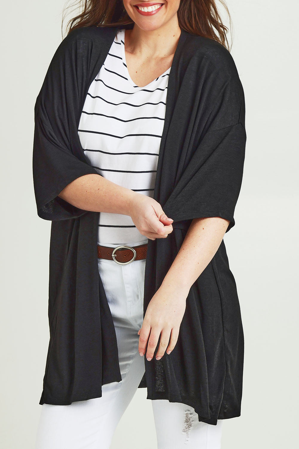 Model Jane wearing size 14 of The Perfect Summer Knit Cardi in colour Black (Black), from the front, cropped image
