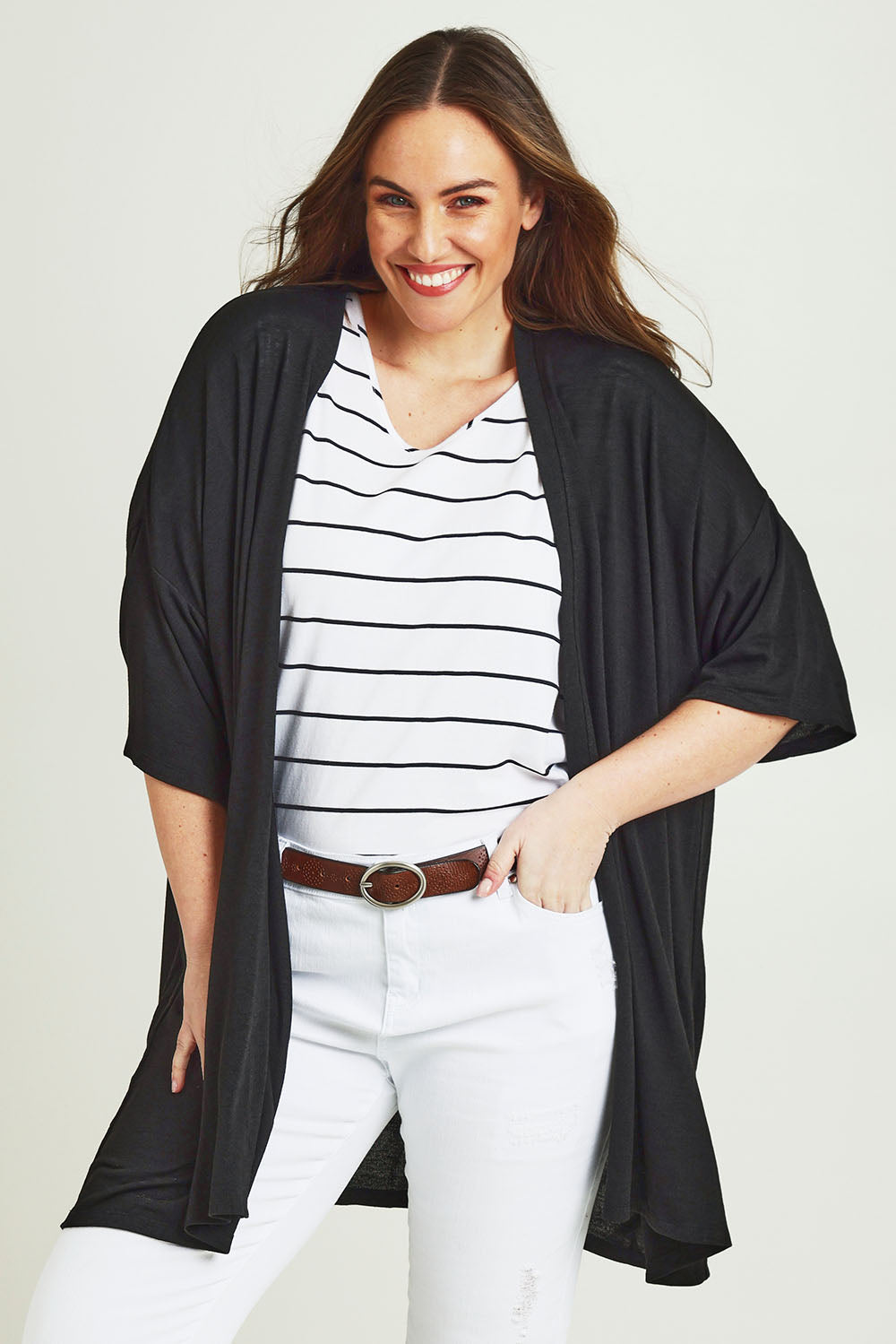Model Jane wearing size 14 of The Perfect Summer Knit Cardi in colour Black (Black), from the front, cropped image