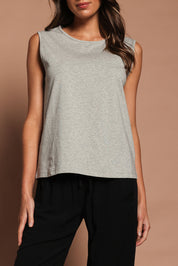 Model Madeline wearing size 10 of The Keepers Classic Tank in colour Greymarle (Grey), from the front, cropped image