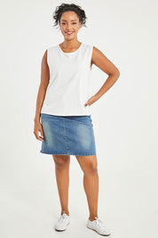 Model Noli wearing size 14 of The Keepers Classic Tank in colour White (White), from the front, showing the whole outfit