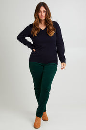 Model Laura wearing size L of The Keepers Soft V Neck Jumper in colour Darknavy (Blue), from the front, showing the whole outfit
