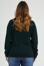 Model Laura wearing size L of The Keepers Soft V Neck Jumper in colour Darkpetrol (Blue), from the back