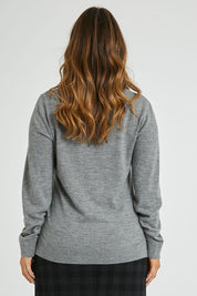 Model Laura wearing size L of The Keepers Soft V Neck Jumper in colour Greymarle (Grey), from the back