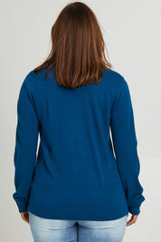 Model Monique wearing size L of The Keepers Soft V Neck Jumper in colour Petrol (Blue), from the back
