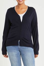Model Noli wearing size L of The Keepers Soft Button Up Cardigan in colour Deepnavy (Blue), from the front, cropped image