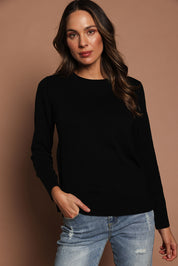 Model Madeline wearing size S of The Keepers Soft Round Neck Jumper in colour Black (Black), from the front, showing the whole outfit
