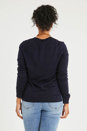 Model Noli wearing size L of The Keepers Soft Round Neck Jumper in colour Darknavy (Blue), from the back