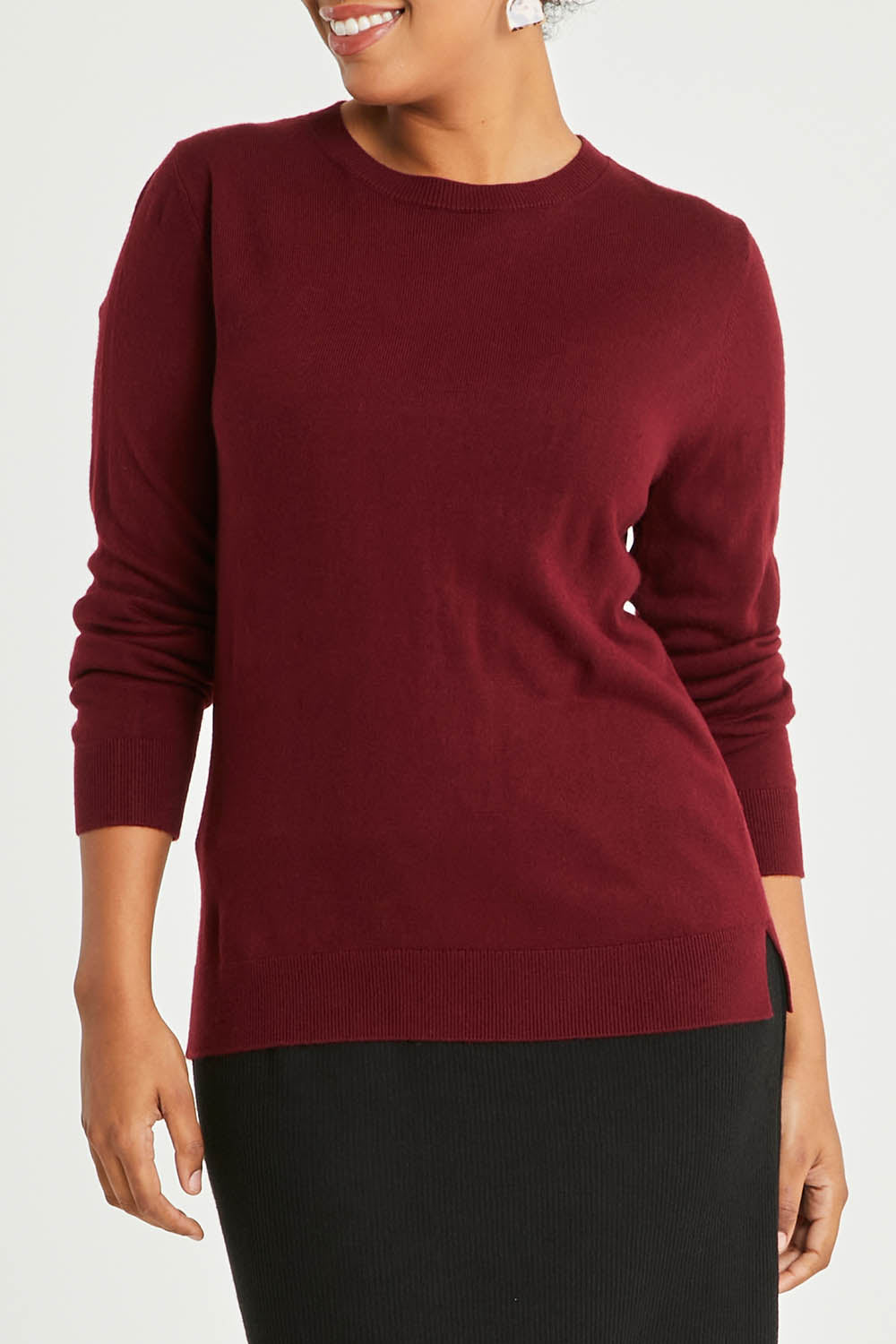 Model Noli wearing size L of The Keepers Soft Round Neck Jumper in colour Firered (Red), from the front, cropped image