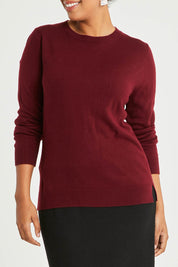Model Noli wearing size L of The Keepers Soft Round Neck Jumper in colour Firered (Red), from the front, cropped image