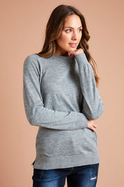 Model Madeline wearing size S of The Keepers Soft Round Neck Jumper in colour Greymarle (Grey), from the front, showing the whole outfit