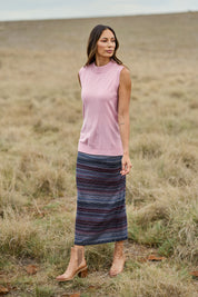 Model Amanda wearing size S of The Soft Sleeveless Mockturtle Jumper in colour Dustypink (Pink), from the front, showing the whole outfit