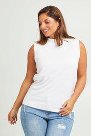 Model Monique wearing size L of The Soft Sleeveless Mockturtle Jumper in colour White (White), from the front, cropped image