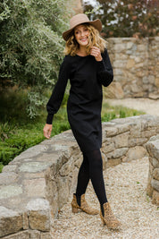 Model Emma wearing size 10 of The Keepers Classic Ponte Dress in colour Black (Black), from the front, showing the whole outfit