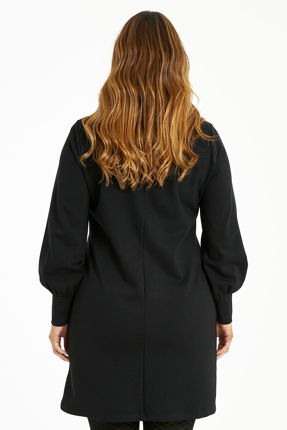 Model Laura wearing size 14 of The Keepers Classic Ponte Dress in colour Black (Black), from the back