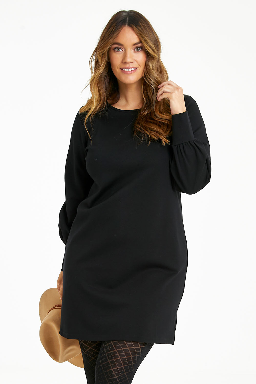 Model Laura wearing size 14 of The Keepers Classic Ponte Dress in colour Black (Black), from the front, cropped image