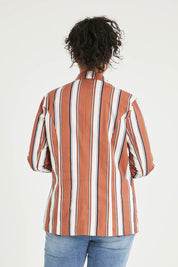 Model Noli wearing size 14 of The Classic Stripe Blazer in colour Navyrust (Blue), from the back