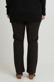 Model Laura wearing size 14 of The Ponte Check Pant in colour Blackbrown (Black), from the back