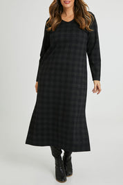 Model Laura wearing size 14 of The Ponte Check Dress in colour Blackgrey (Black), from the front, cropped image