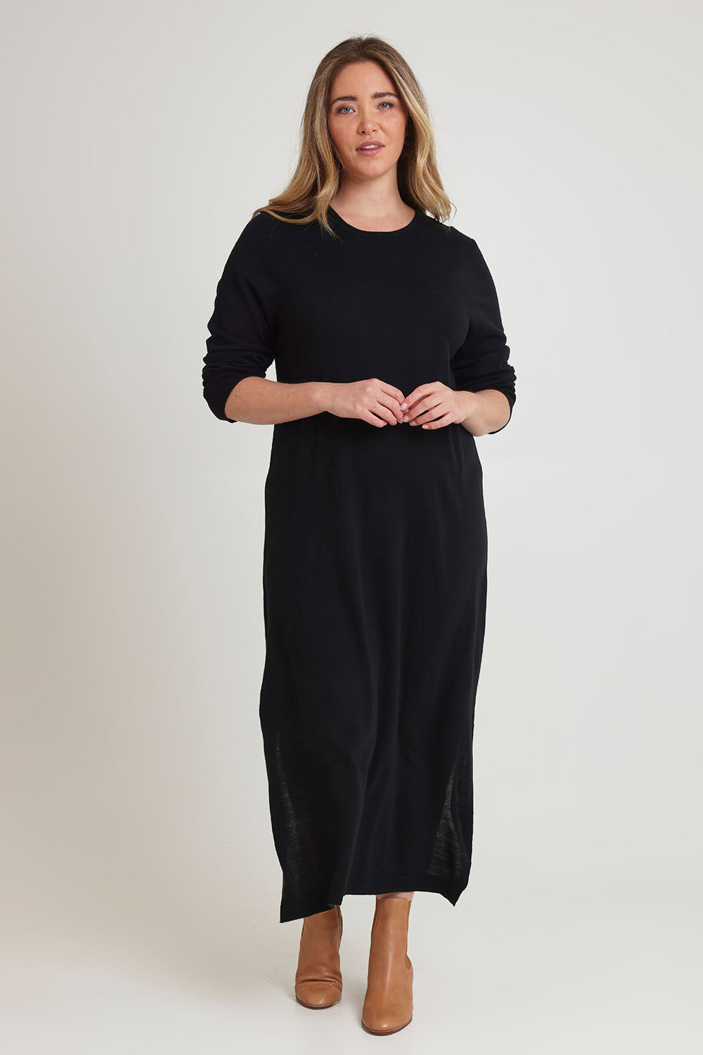 Model Chanel wearing size XL of The Keepers Soft Knit Maxi Dress in colour Black (Black), from the front, showing the whole outfit