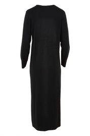 Product shot of The Keepers Soft Knit Maxi Dress in colour Black (Black), from the back