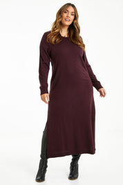 Model Laura wearing size L of The Keepers Soft Knit Maxi Dress in colour Woodberry (Purple), from the front, showing the whole outfit