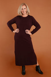 Model Sandy wearing size S of The Keepers Soft Knit Maxi Dress in colour Woodberry (Purple), from the front, showing the whole outfit