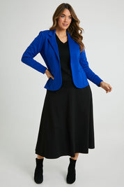 Model Laura wearing size 14 of The Fit And Flare Ponte Skirt in colour Black (Black), from the front, showing the whole outfit