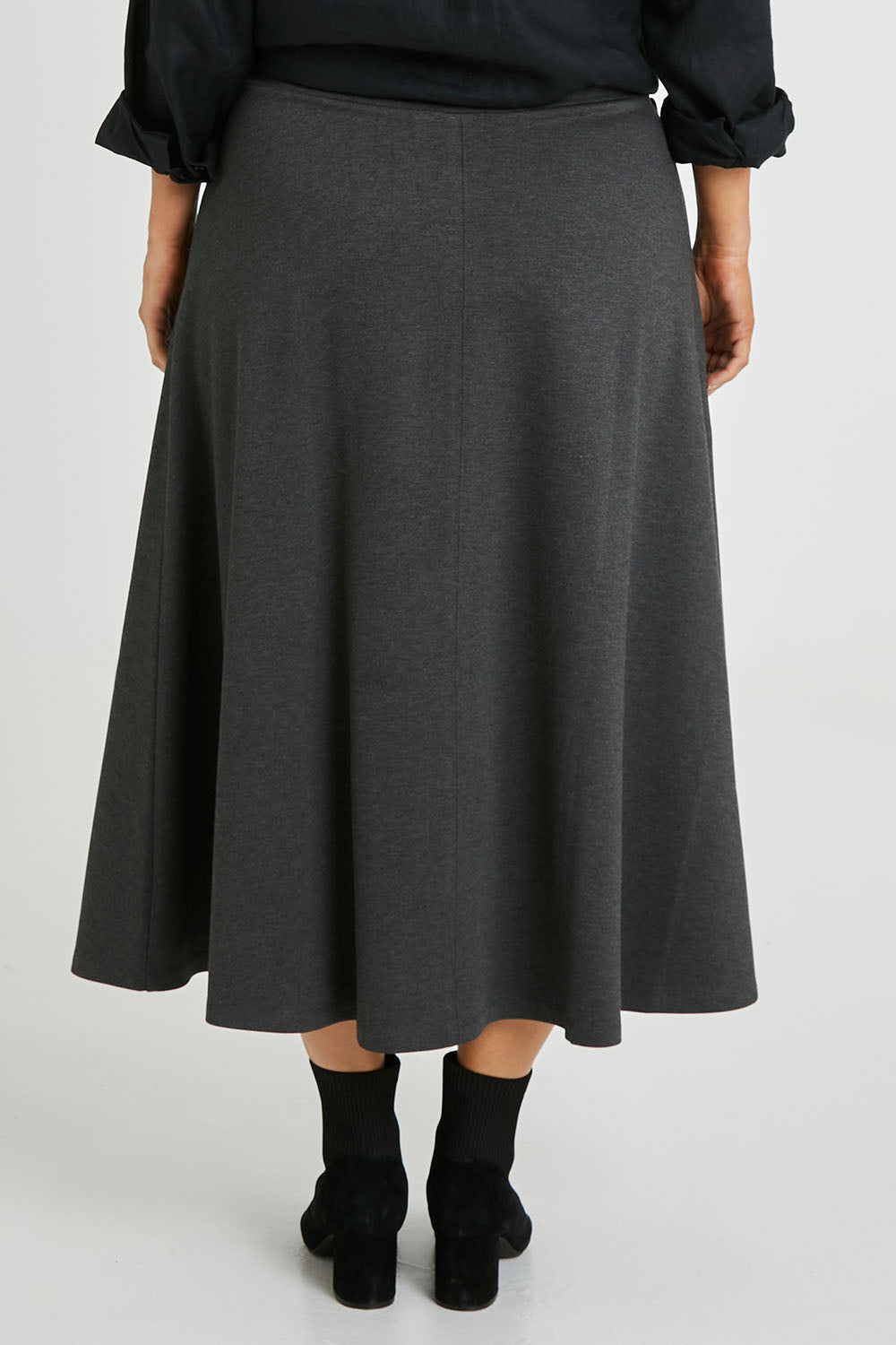 Model Laura wearing size 14 of The Fit And Flare Ponte Skirt in colour Greymarle (Grey), from the back