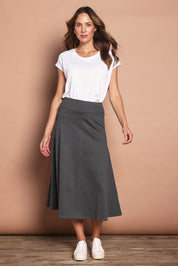 Model Madeline wearing size 10 of The Fit And Flare Ponte Skirt in colour Greymarle (Grey), from the front, showing the whole outfit