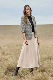 Model Amanda wearing size 10 of The Fit And Flare Ponte Skirt in colour Nougat, from the front, showing the whole outfit
