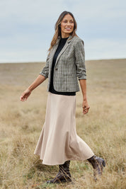 Model Amanda wearing size 10 of The Fit And Flare Ponte Skirt in colour Nougat, from the front, showing the whole outfit
