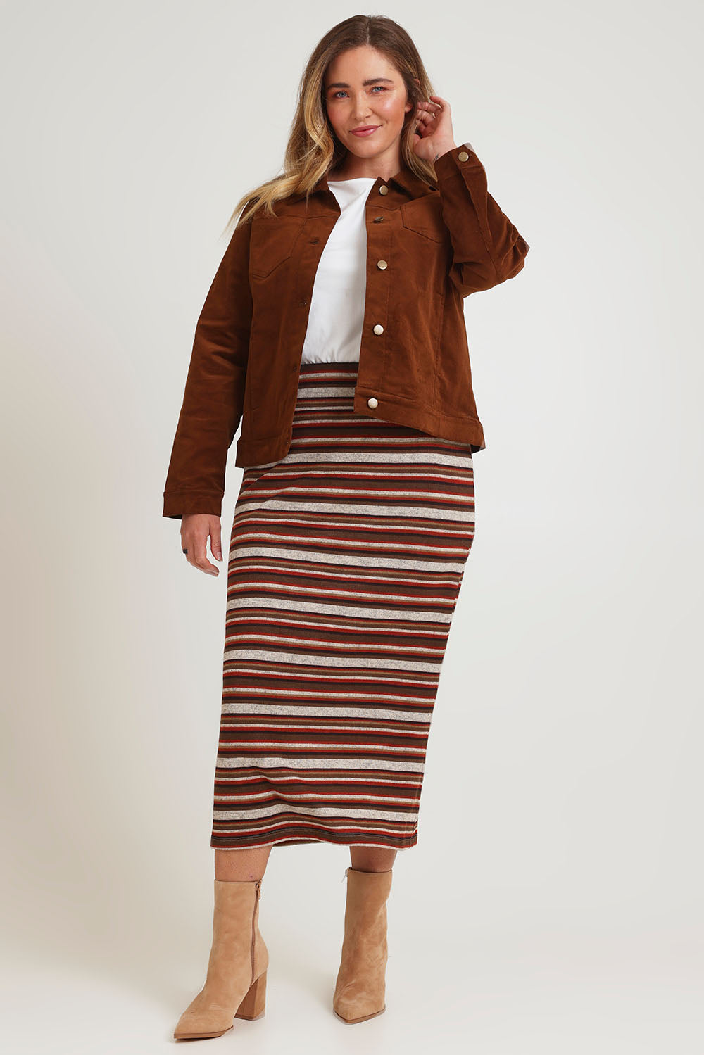 Model Chanel wearing size 16 of The Striped Knit Lined Skirt in colour Warmtones (Grey), from the front, showing the whole outfit