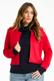 Model Laura wearing size 14 of The Edge To Edge Ponte Blazer in colour Red (Red), from the front, cropped image