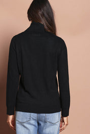 Model Amanda wearing size S of The Keepers Soft Roll Neck Jumper in colour Black (Black), from the back
